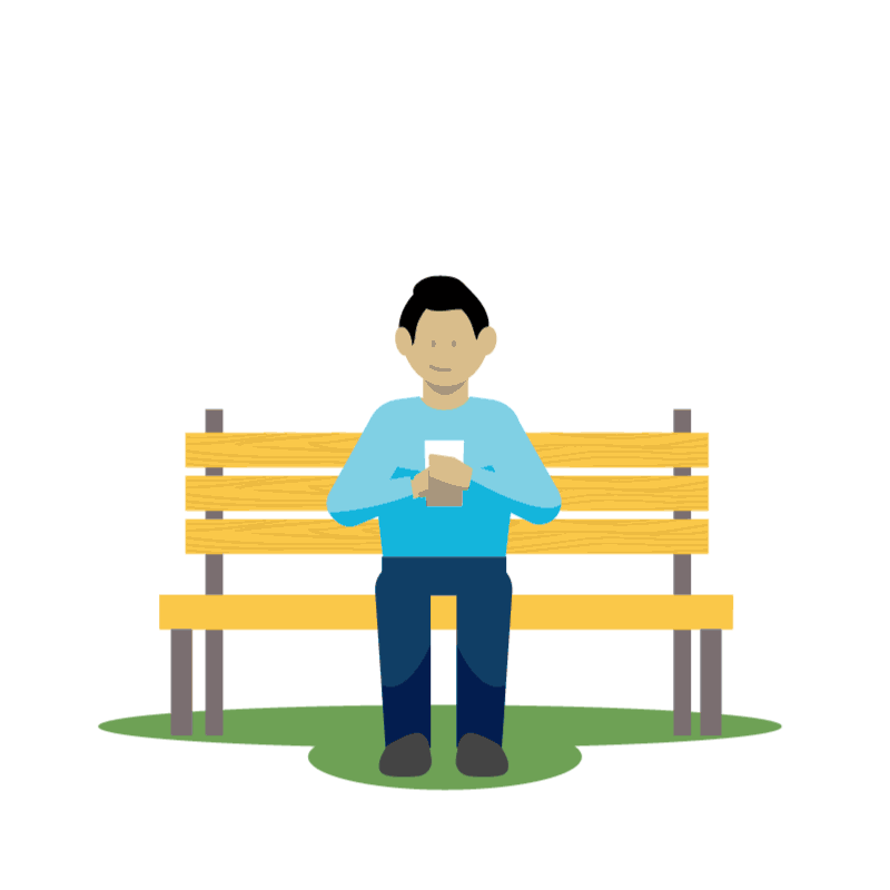 man sitting on a bench using his phone