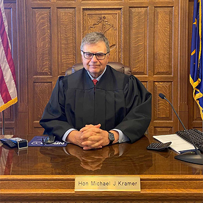 Hon. Michael J. Kramer at his bench in Noble County.