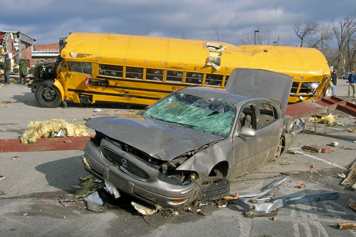 Damaged bus and car