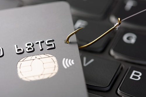 Debit card pierced by a fishing hook