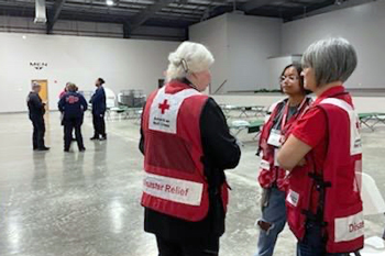 Red Cross workers chatting