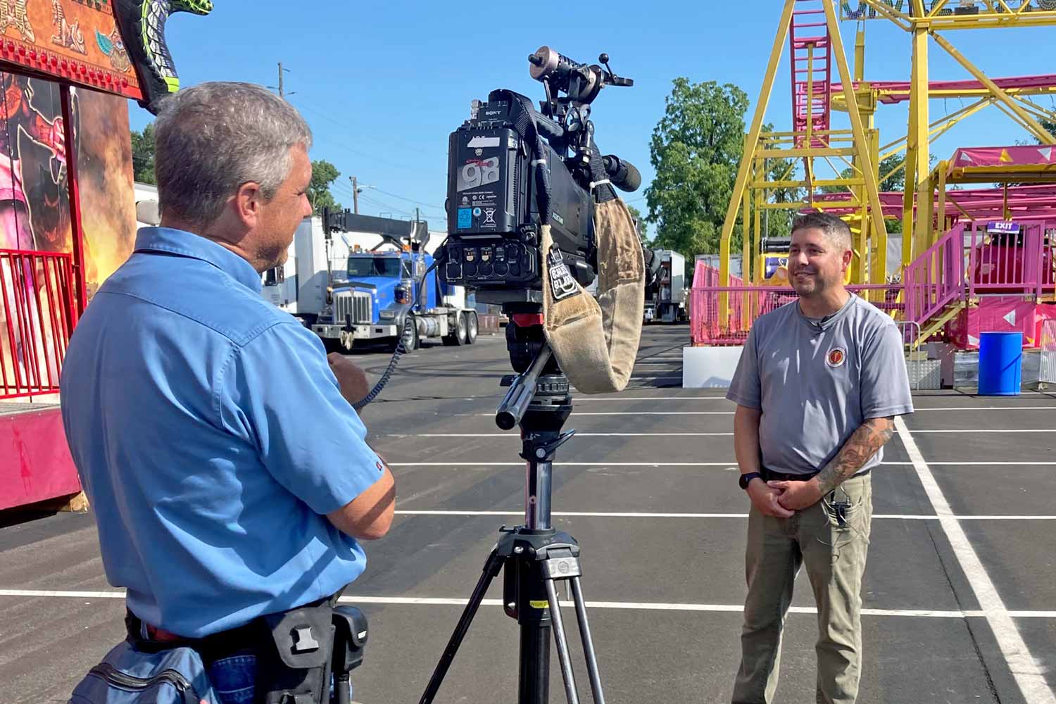 Media interview at state fair midway