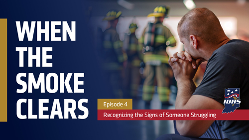 Firefighter sits alone in firehouse