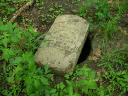 A fallen grave stone