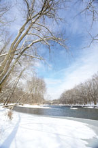 The White River sweeps alongside Holliday Park in Indianapolis.