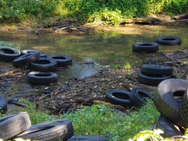 Tires in creek