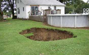 Subsidence next to a back yard pool.