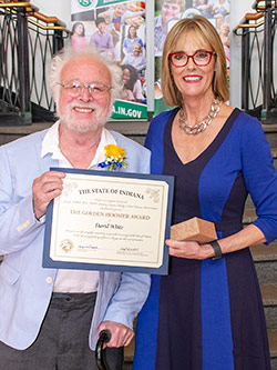 Picture of David White receiving the award from the Lieutenant Governor
