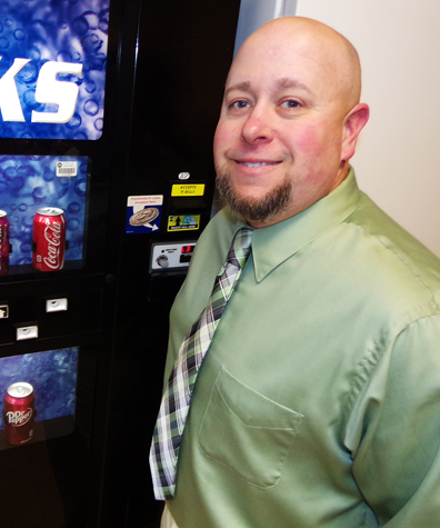 Photo of Brian at vending machine