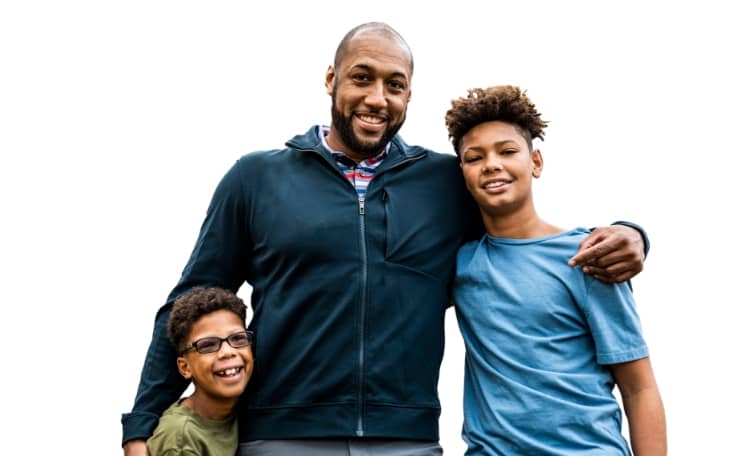 Father and sons embracing.