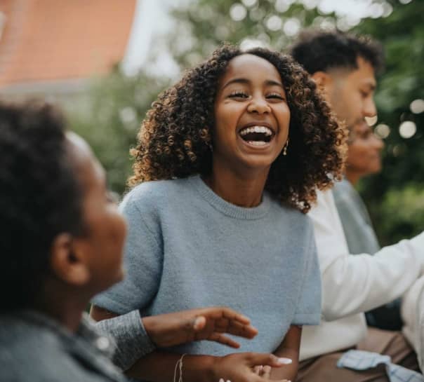 Group of people laughing.
