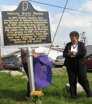 Jane Sarles, the marker applicant, unveiled the historical marker.