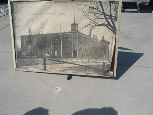 This large photograph is of the original Conn factory that stood on this site.