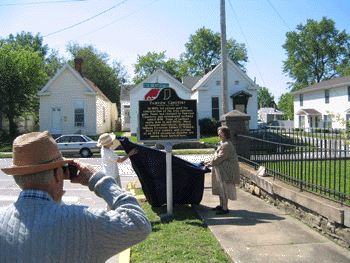 Mary Clipp and Alice Bower unveil the marker.Alice Bower led a tour of the cemetery after the dedication.
