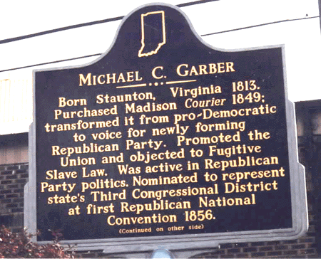 The marker is located at the The Madison Courier office, 310 West Street, Madison.