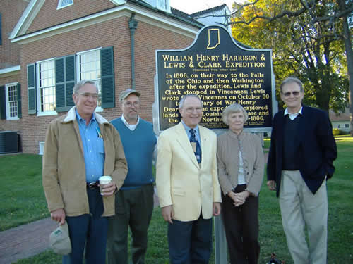 Jerry Robertson, Jim Holmberg, Jim Keith, Linda Robertson, and Brad Brakke stand in for a picture in front the newly installed marker.