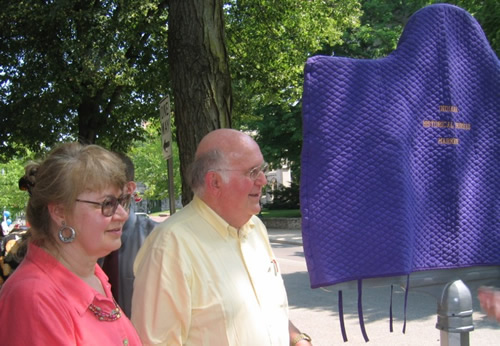 Marker applicant, Nancy Hiestand, and Bob Hammel, who was also involved in the marker application process, prepare to unveil the marker.
