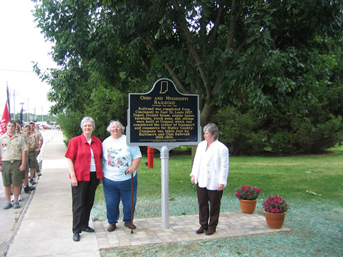 Standing with Paula Bongen is Helen Todd Einhaus, historian for Ripley County and historian Diane Perrine Coon.