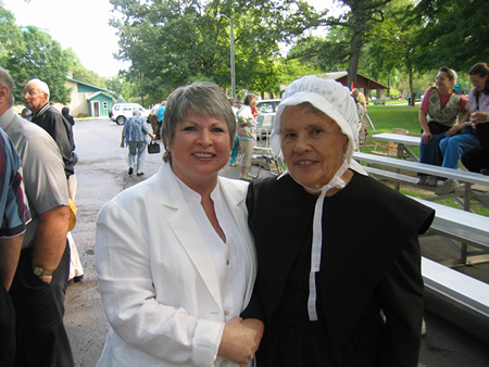 Paula Bongen (left) poses with Sarah Major (portrayed by Joan Deeter). Sarah Major is believed to be the first woman to preach publicly in North Manchester.