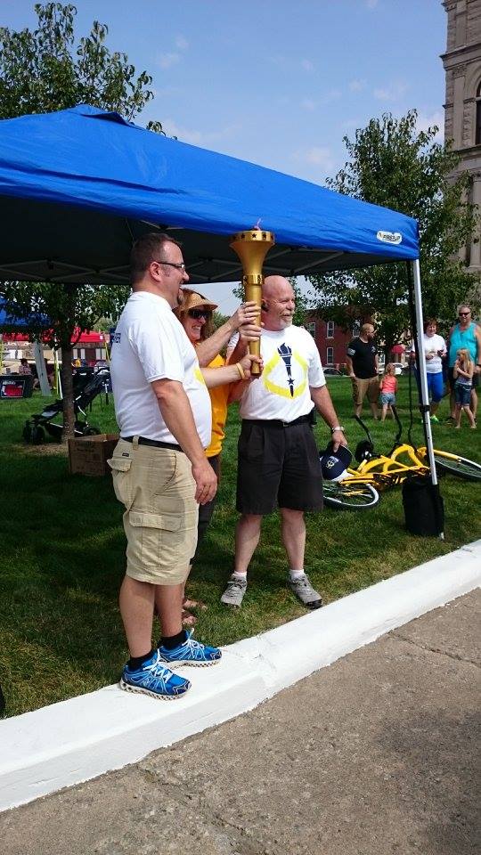 Bicentennial Mayor, Chuck, Sharon, with the torch