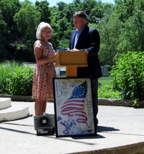 Regent Karen VanScoyoc Ward presenting the flag to Mayor Randy Strasser, Flag Day (June 14) 2014. Photo courtesy of Mark A. Smith, Carroll County Historian.