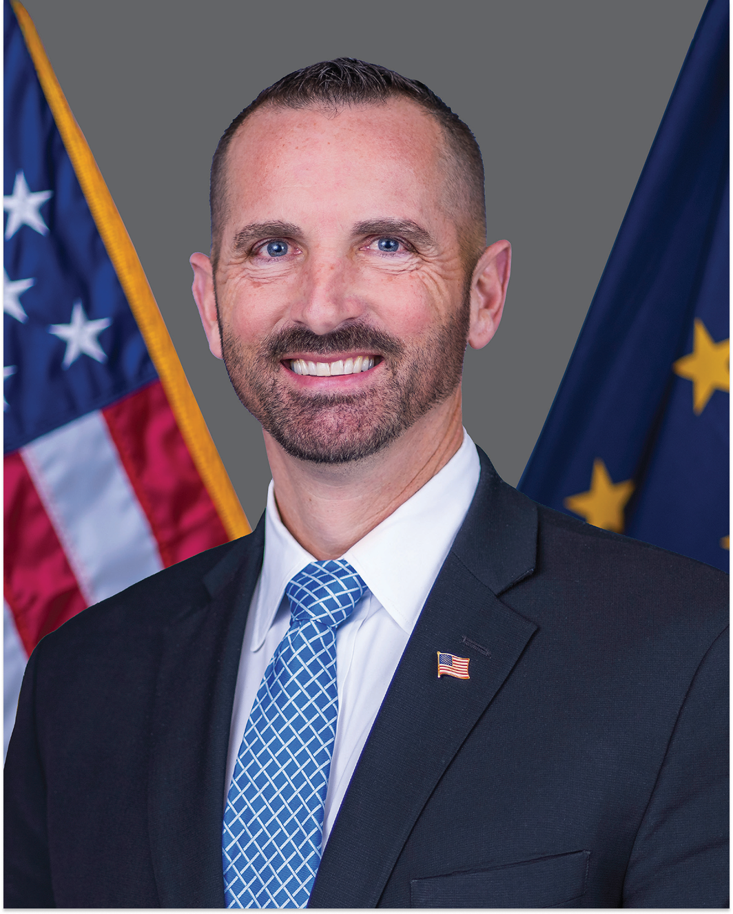 Headshot of Current Commissioner